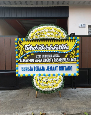 Papan Bunga Duka di Marong